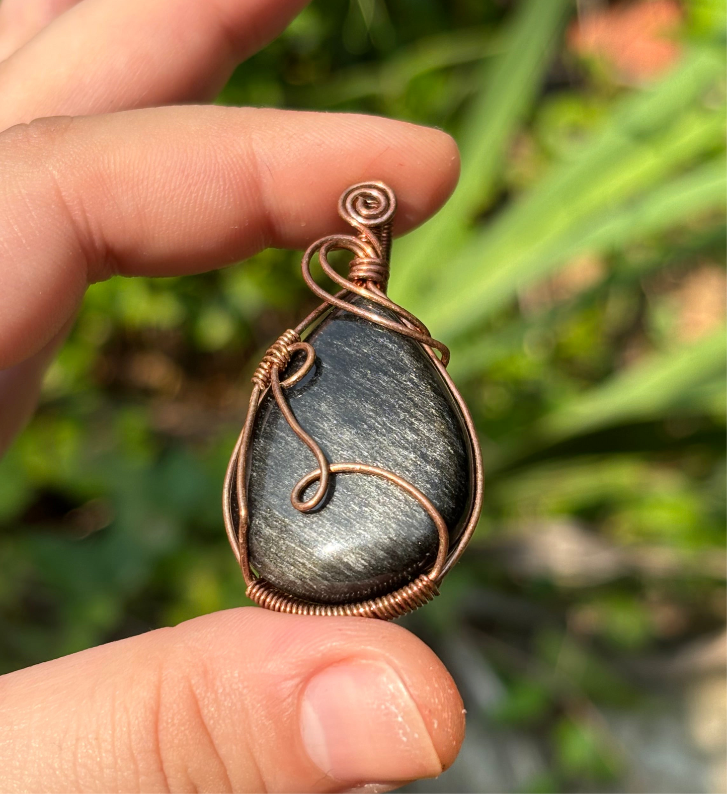 Silver sheen obsidian pendant
