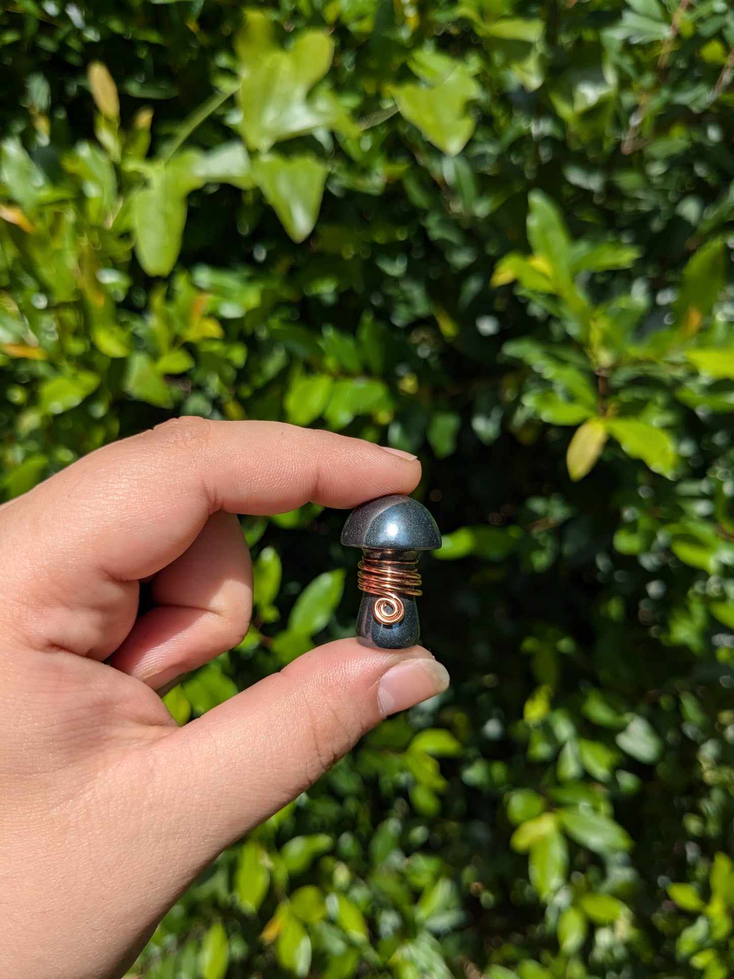 Simple hematite mushroom pendant