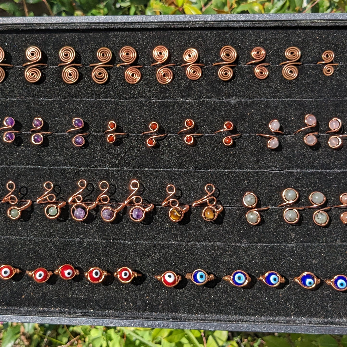 Simple adjustable crystal rings